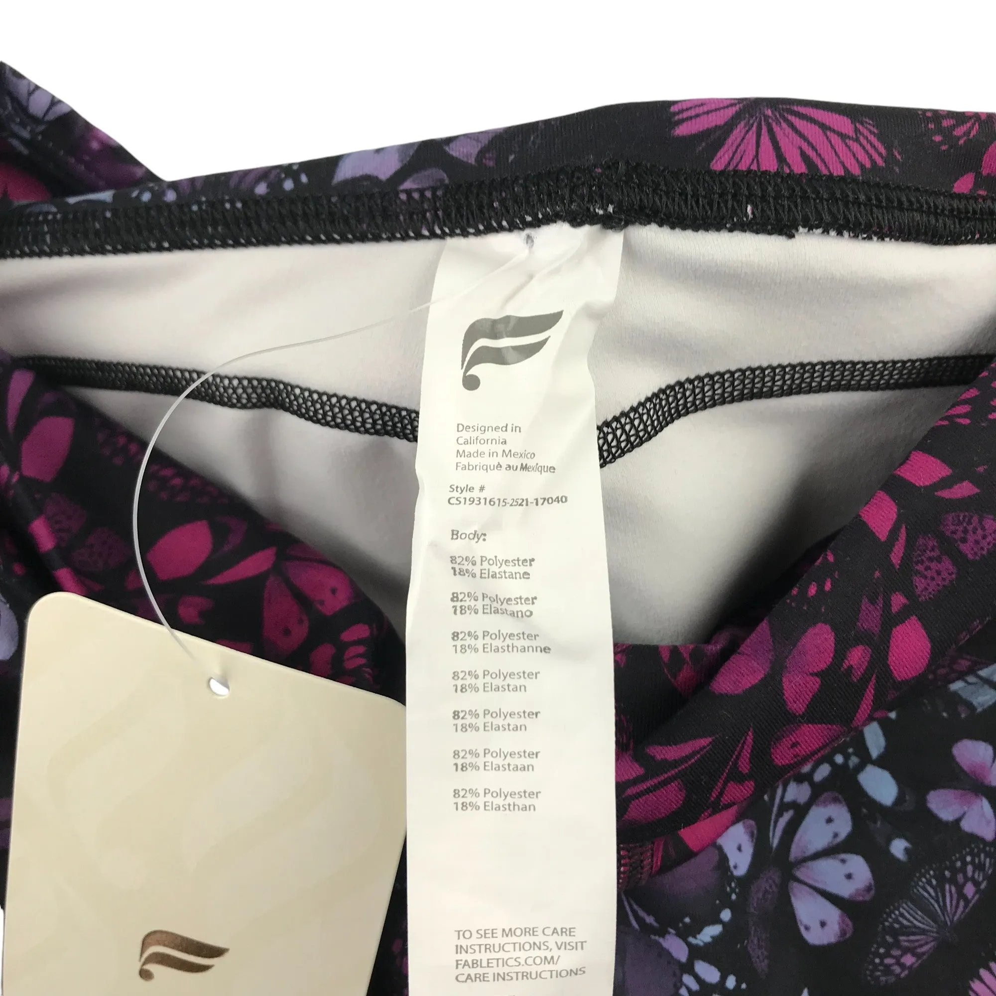 Fabletics sport leggings women size M purple and pink butterfly print capri length