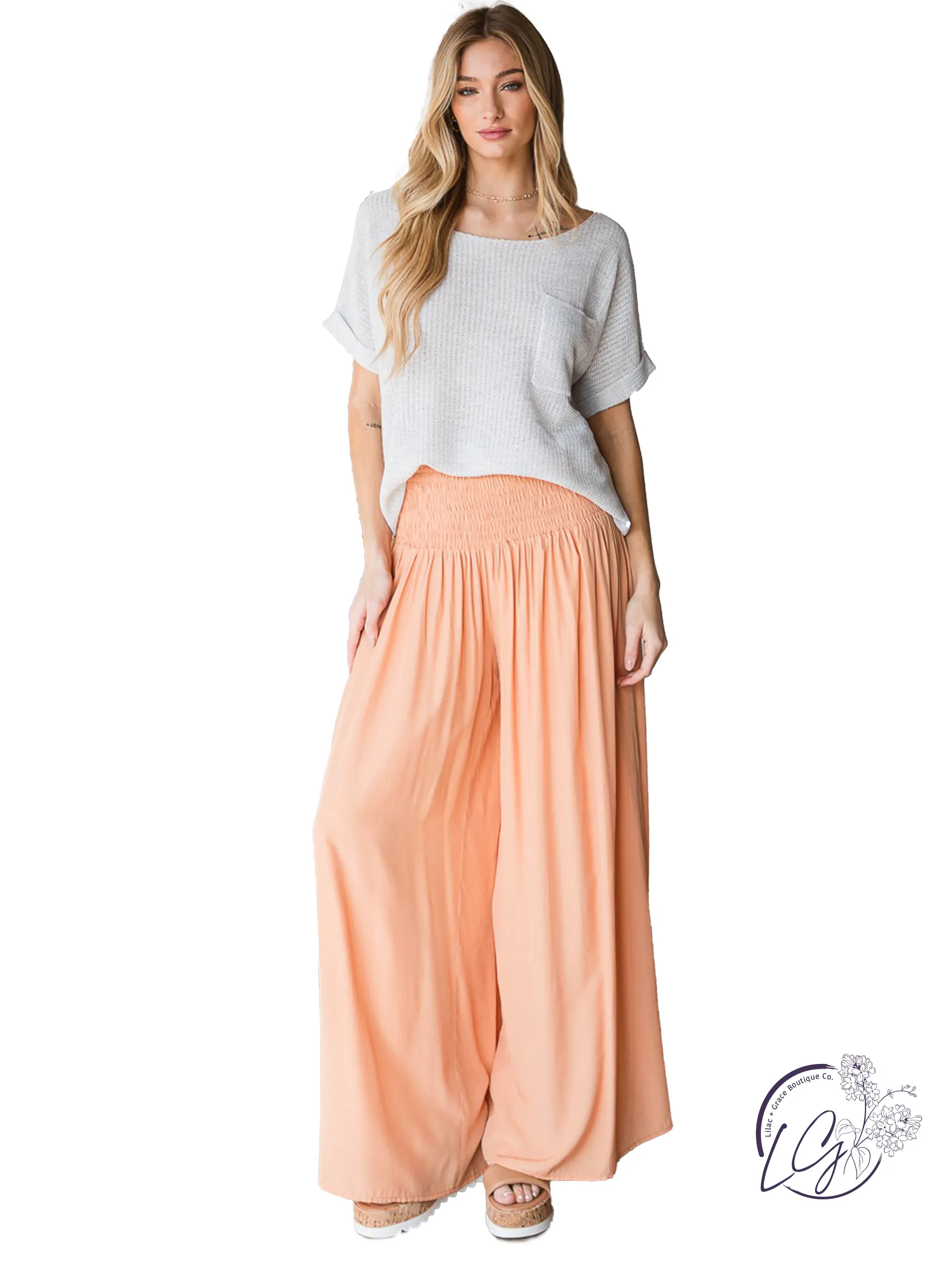 Smocked Elegance Wide-Leg Trousers